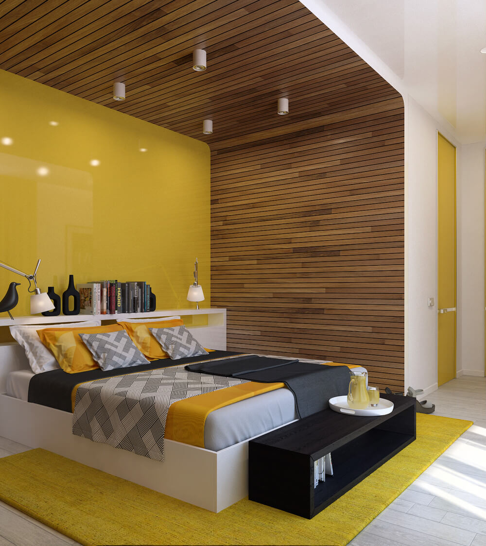 Phòng ngủ với mảng tường màu vàng nổi bật, ấn tượng.
