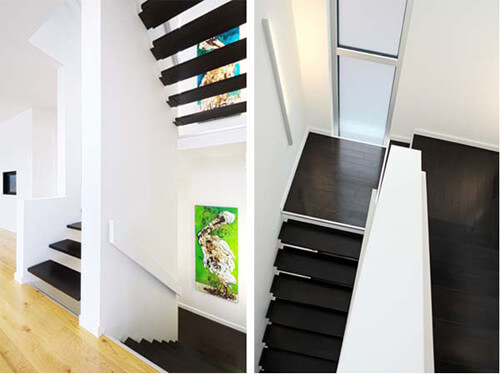 Màu đen tạo cảm giác những bậc thang đang lơ lửng trong không trung, trong thiết kế nhà phố 2 tầng, ấn tượng