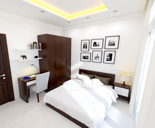 Thiết kế nhà phố với phòng ngủ dành cho khách được thiết kế đơn giản nhưng đầy đủ tiện nghi, bàn làm việc, tạo cảm giác thoải mái
