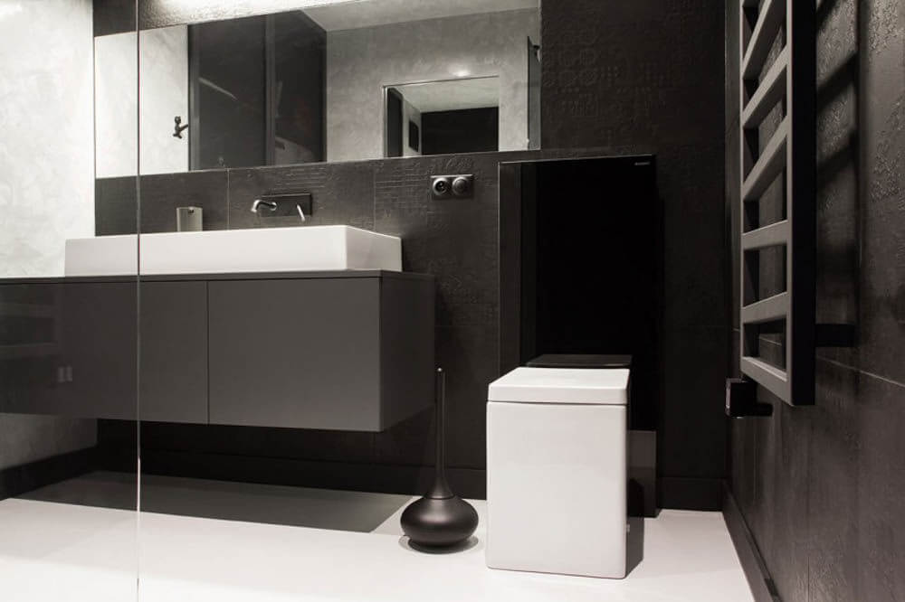 Phòng tắm nhà chung cư cải tạo sửa chữa hiện đại sang trọng với tông màu xám - trắng.