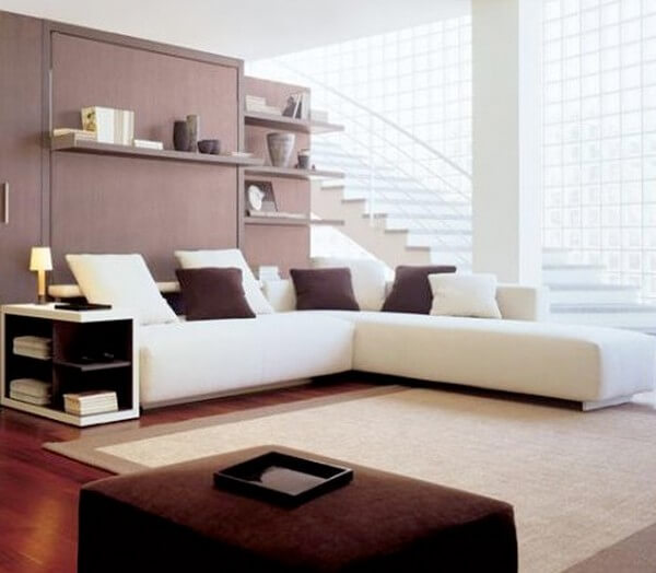 Sửa chữa cải tạo nhà với phòng khách bố trí bộ sofa chữ L có thiết kế đặc biệt phù hợp với mặt bằng căn hộ.