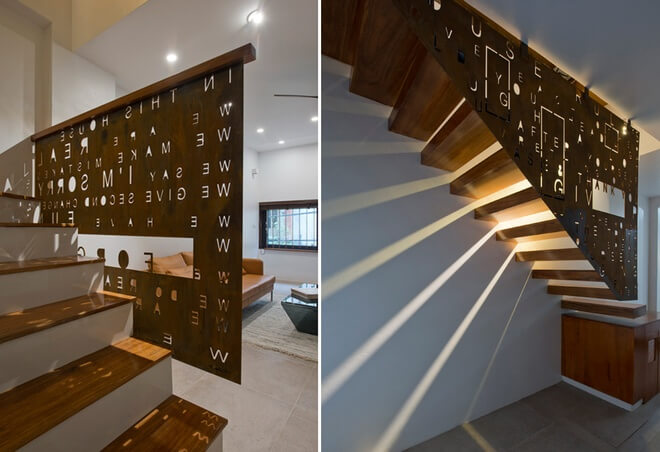 Những bậc rỗng và khoảng hở của các chữ cái tạo ra nguồn sáng sinh động trên cầu thang và sàn nhà của mẫu thiết kế nhà 4 tầng này.